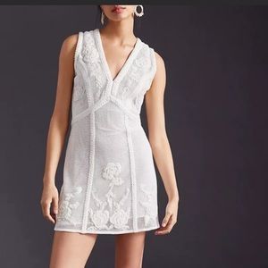 Not so serious white beaded mini dress